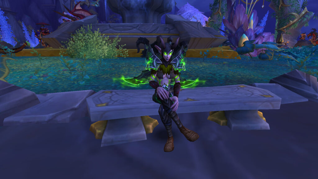 WoW demon hunter is sitting on a bench